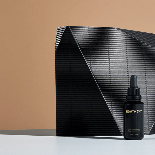 Image hands holding Eighth Day serum